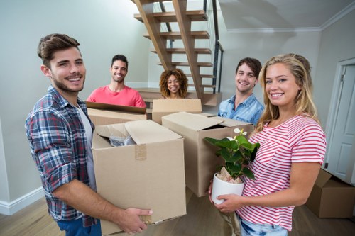 Office relocation planning in Barnes with moving boxes and desk setup