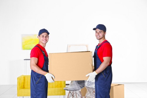 Moving boxes and furniture loaded into a removal truck