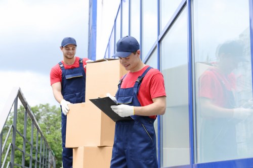 Commercial move preparation with labeled boxes and equipment