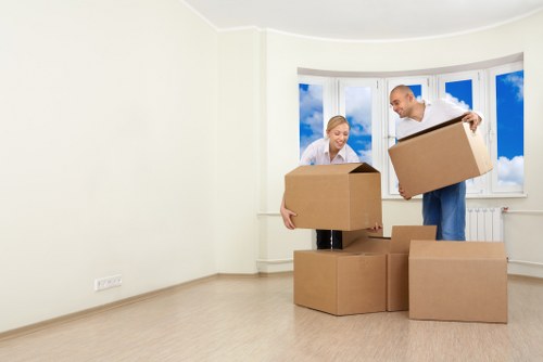 A moving day scene in Barnes with boxes and transport