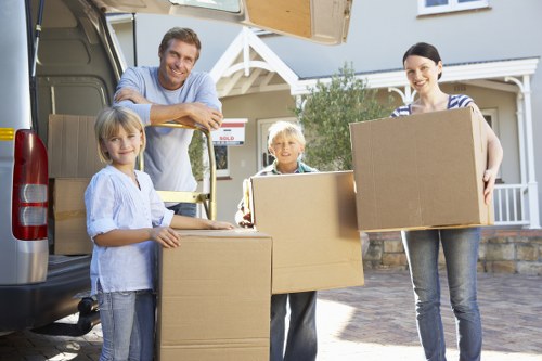 Local Barnes moving team handling household items carefully