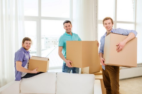 Professional movers loading furniture for a Barnes relocation