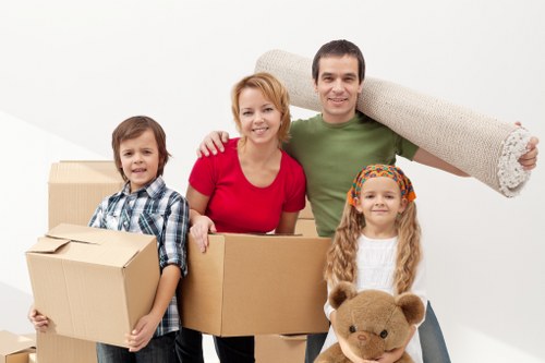 Loading household items into a van using cubic-yard pricing