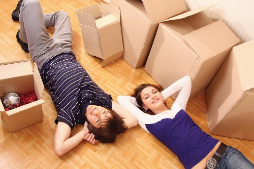 Furniture and packed boxes inside a removal van